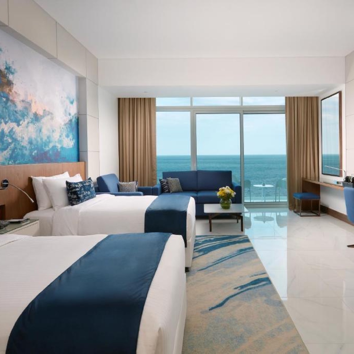 Royal M Superior Twin Room with two beds and a sea view
